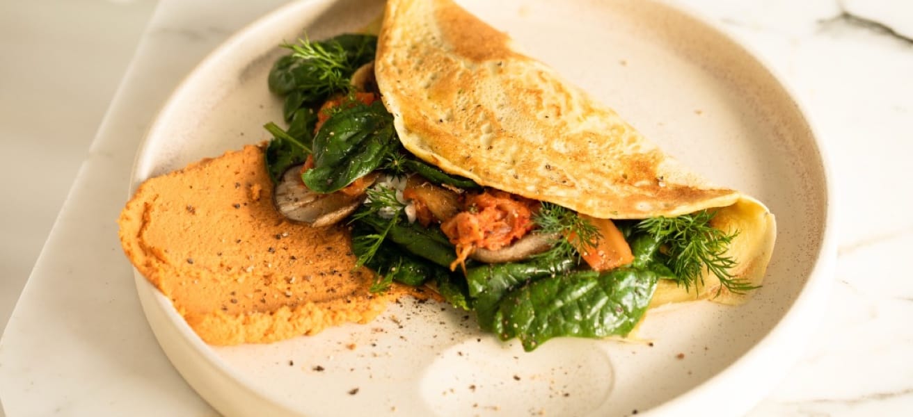 filled omelette served on plate